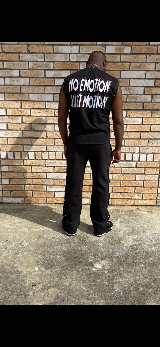 cut of sleeveless shirt with flared cotton pants